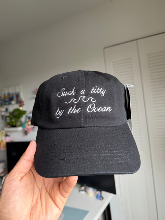 Black cap with white text